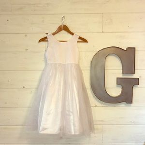 Jona Michelle girls white dress with underskirt.